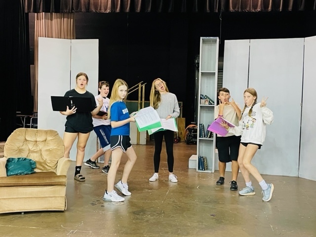Theater students rehearsing their play