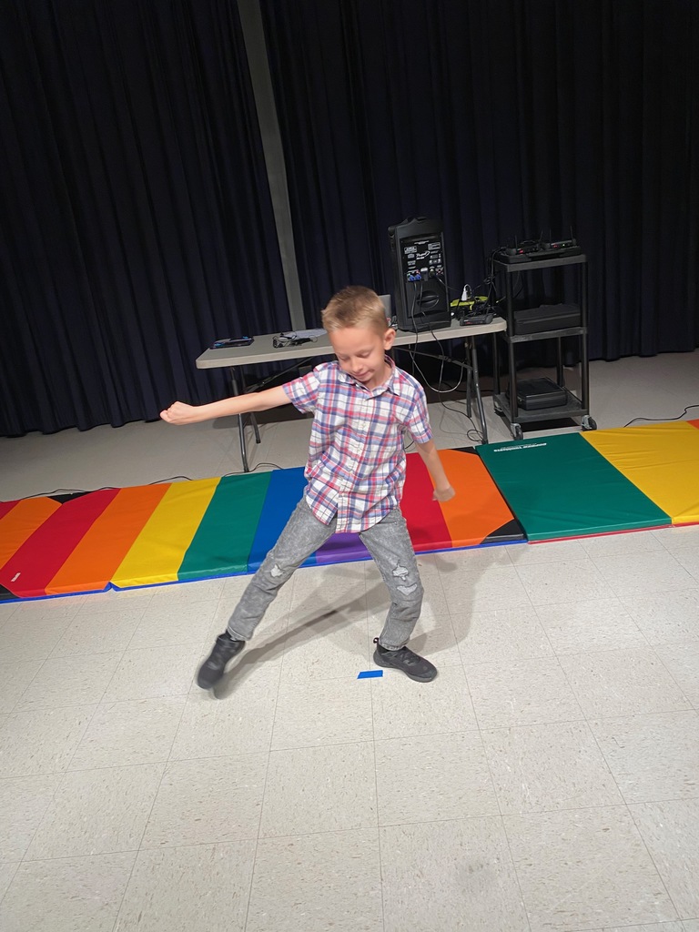 Boy in his dance pose. 