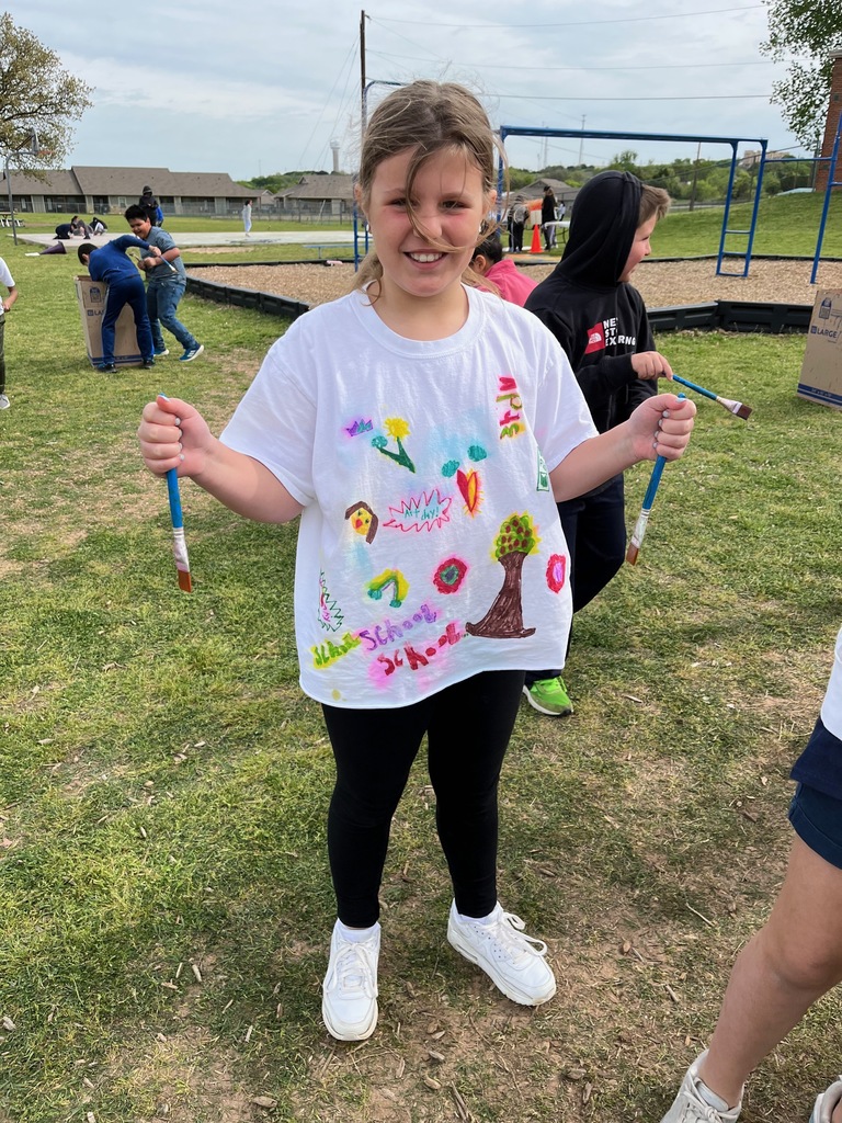 3rd grade girl in her art shirt. 